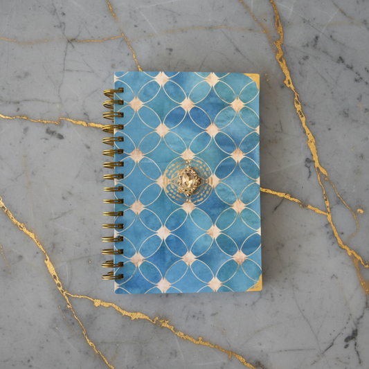 Blue Mirage Notebook on gray and gold countertop